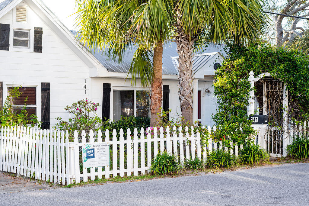 141 Miami Street Miramar Beach, FL 32550 - Photo 25 of 31 a front view of a house with a garden