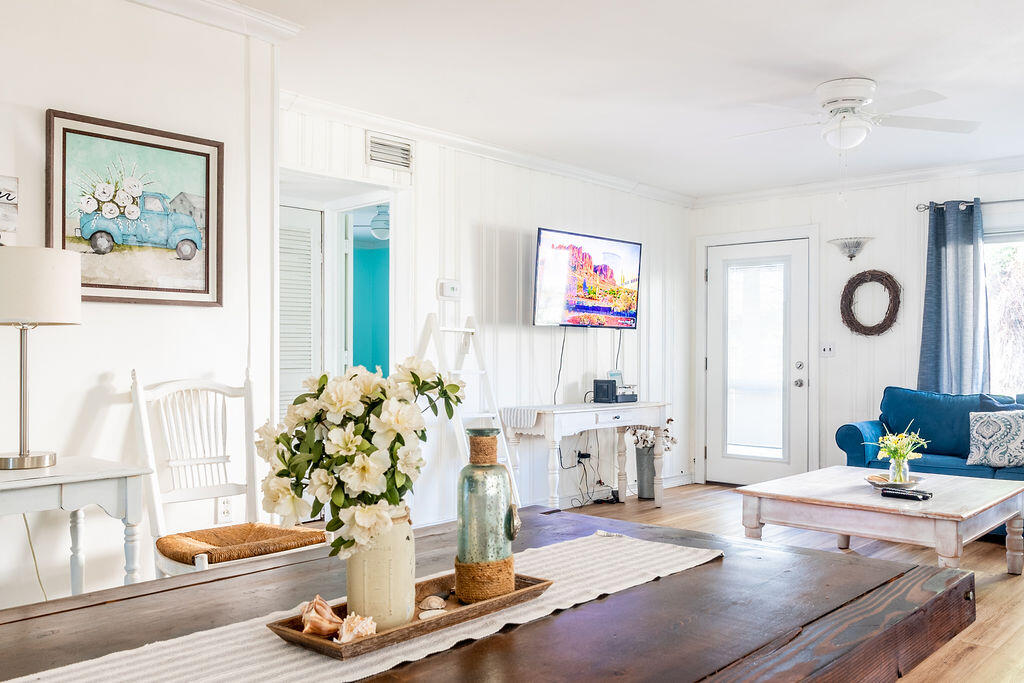 141 Miami Street Miramar Beach, FL 32550 - Photo 6 of 31 a living room with furniture and flowers