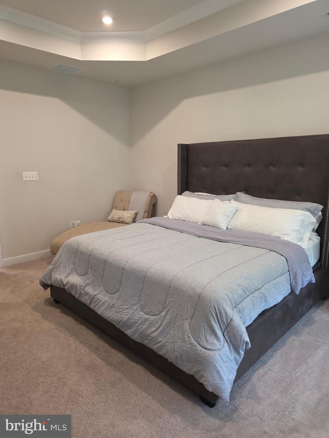 14510 Hunts Farm Road Brandywine, MD 20613 - Photo 37 of 74 a bedroom with a bed and a night stand