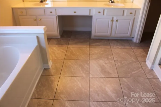 an empty room with wooden door