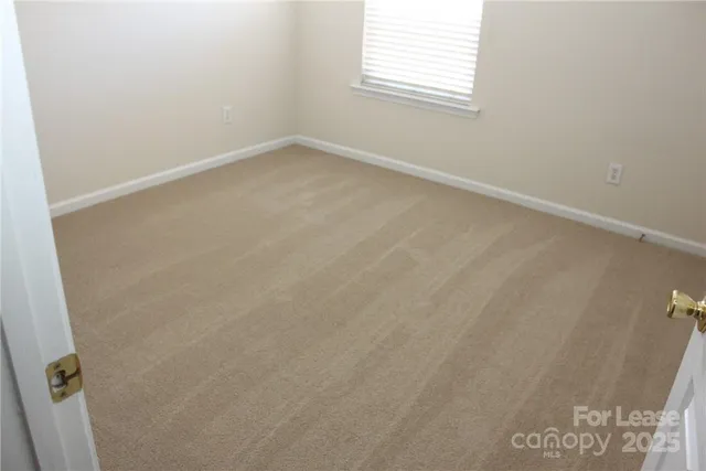 a white toilet sitting next to a bath tub and a shower