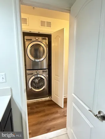 a view of storage and utility room with washer and dryer