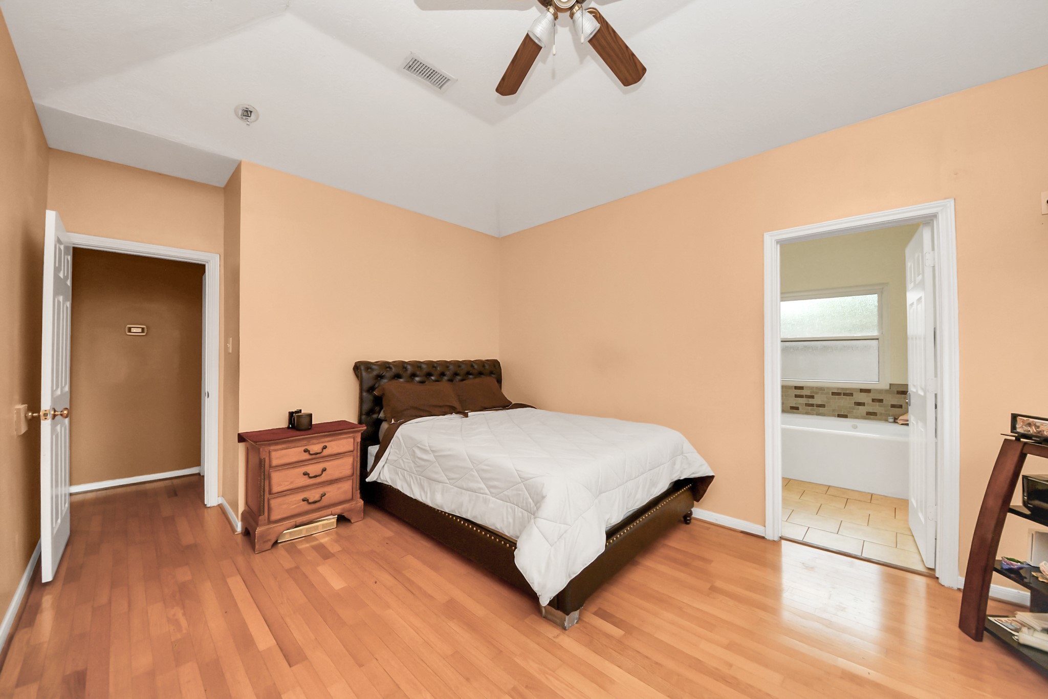 23814 Spring Dane Drive Spring, TX 77373 - Photo 25 of 41 a bedroom with a bed and a table