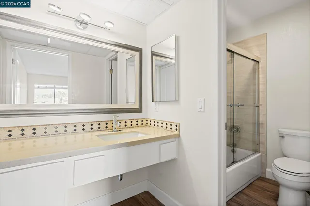 a room with gym equipment and windows