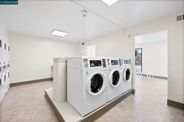 a view of backyard with swimming pool