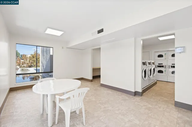 a view of a swimming pool with a sitting space