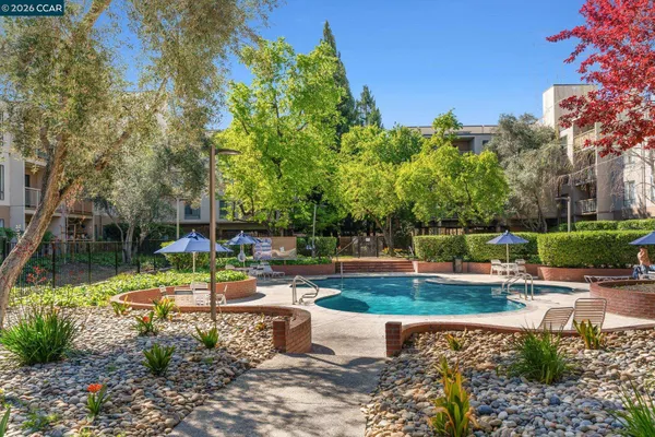 a view of a swimming pool with a sitting space