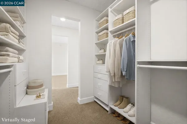 a bathroom with a shower and toilet