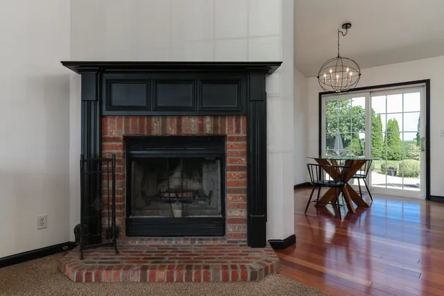 a kitchen with stainless steel appliances a sink a stove a refrigerator and cabinets
