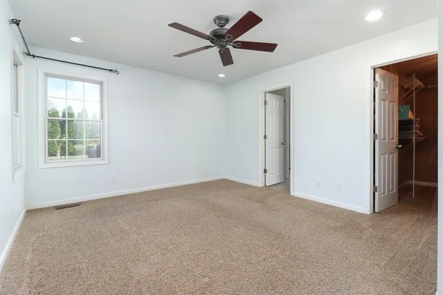 a bathroom with a bathtub and a sink