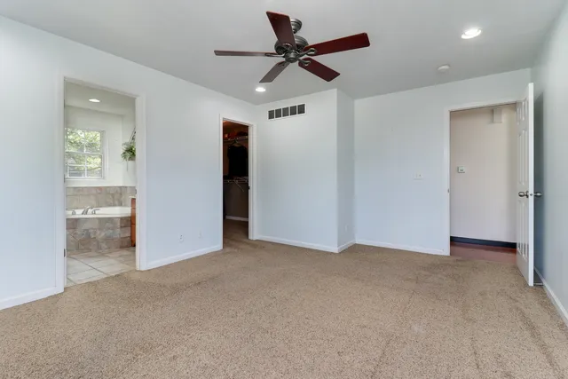 a utility room with sink dryer and washer