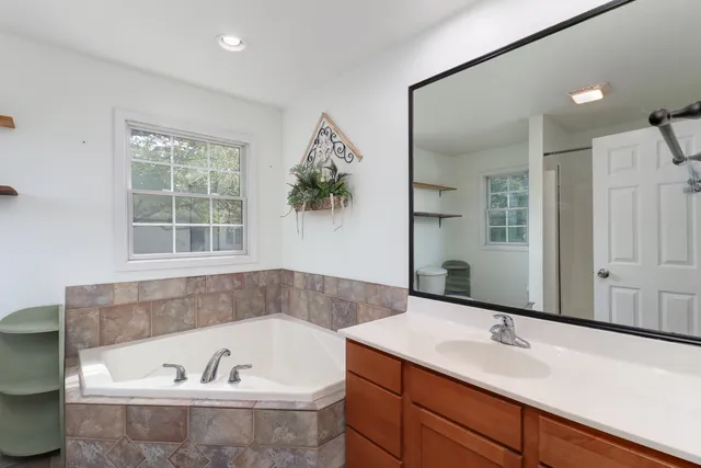 a room with furniture and flat screen tv