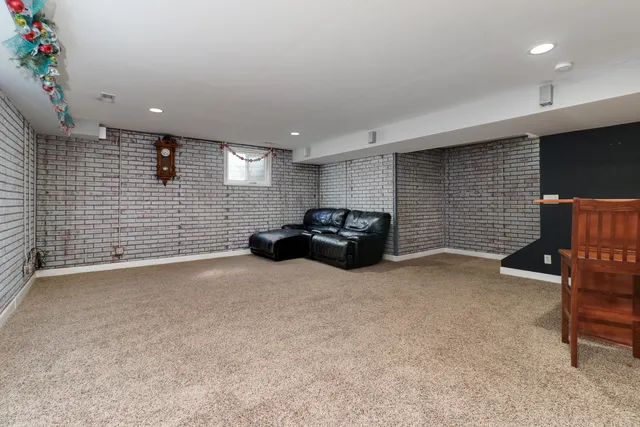 a view of a deck with two chair and a table