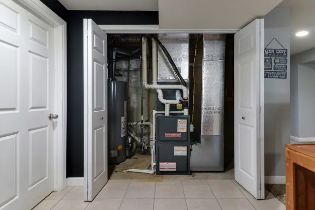 an aerial view of a house with a swimming pool