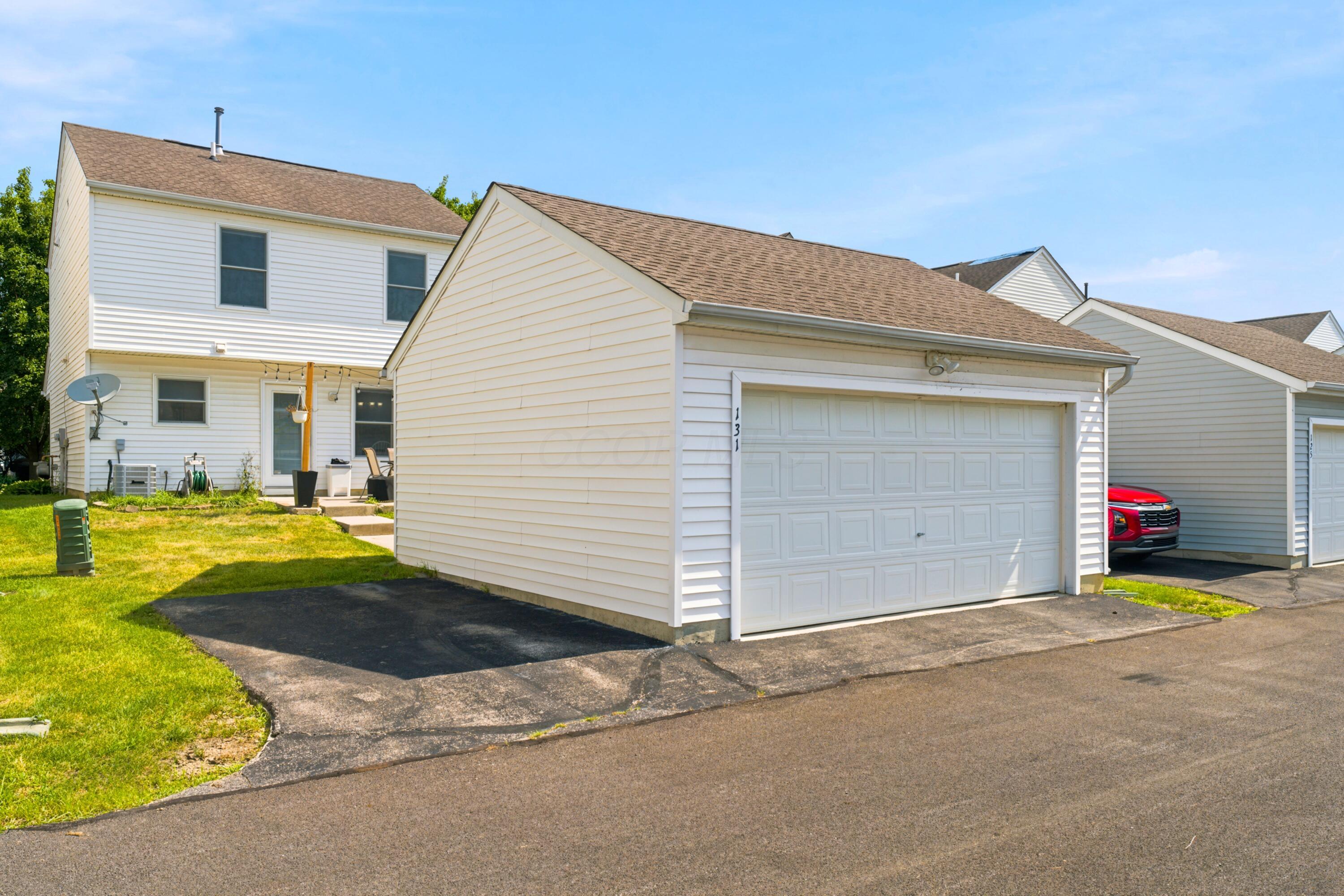 131 Hewes Street Delaware, OH 43015 - Photo 37 of 38 Two car garage and an additional offstreet parking space