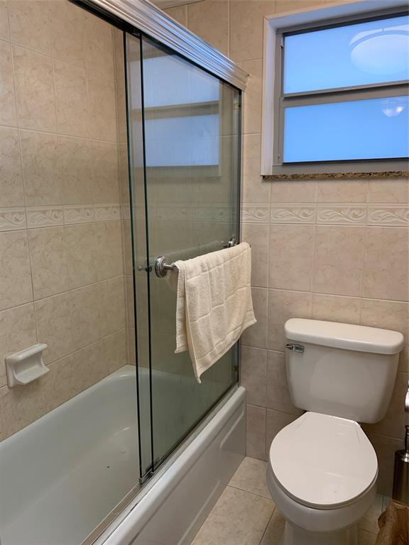 1541 South Ocean Boulevard, Unit 122 Pompano Beach, FL 33062 - Photo 15 of 30 a bathroom with a toilet and a shower