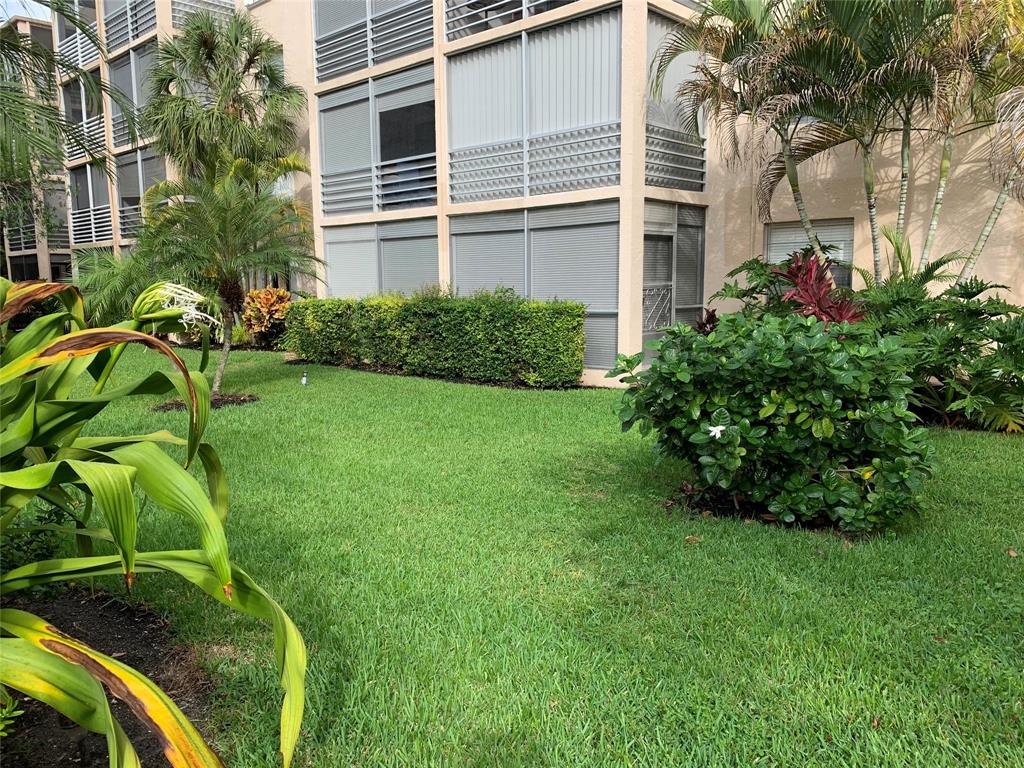 1541 South Ocean Boulevard, Unit 122 Pompano Beach, FL 33062 - Photo 21 of 30 a view of a backyard with plants