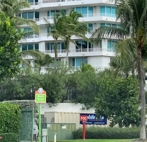 a front view of multi story residential apartment building