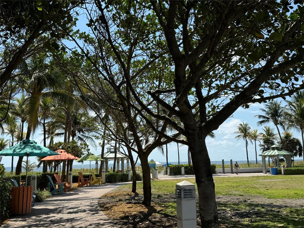 1541 South Ocean Boulevard, Unit 122 Pompano Beach, FL 33062 - Photo 28 of 30 a view of a park with large trees