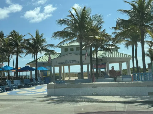a view of multiple houses with a yard