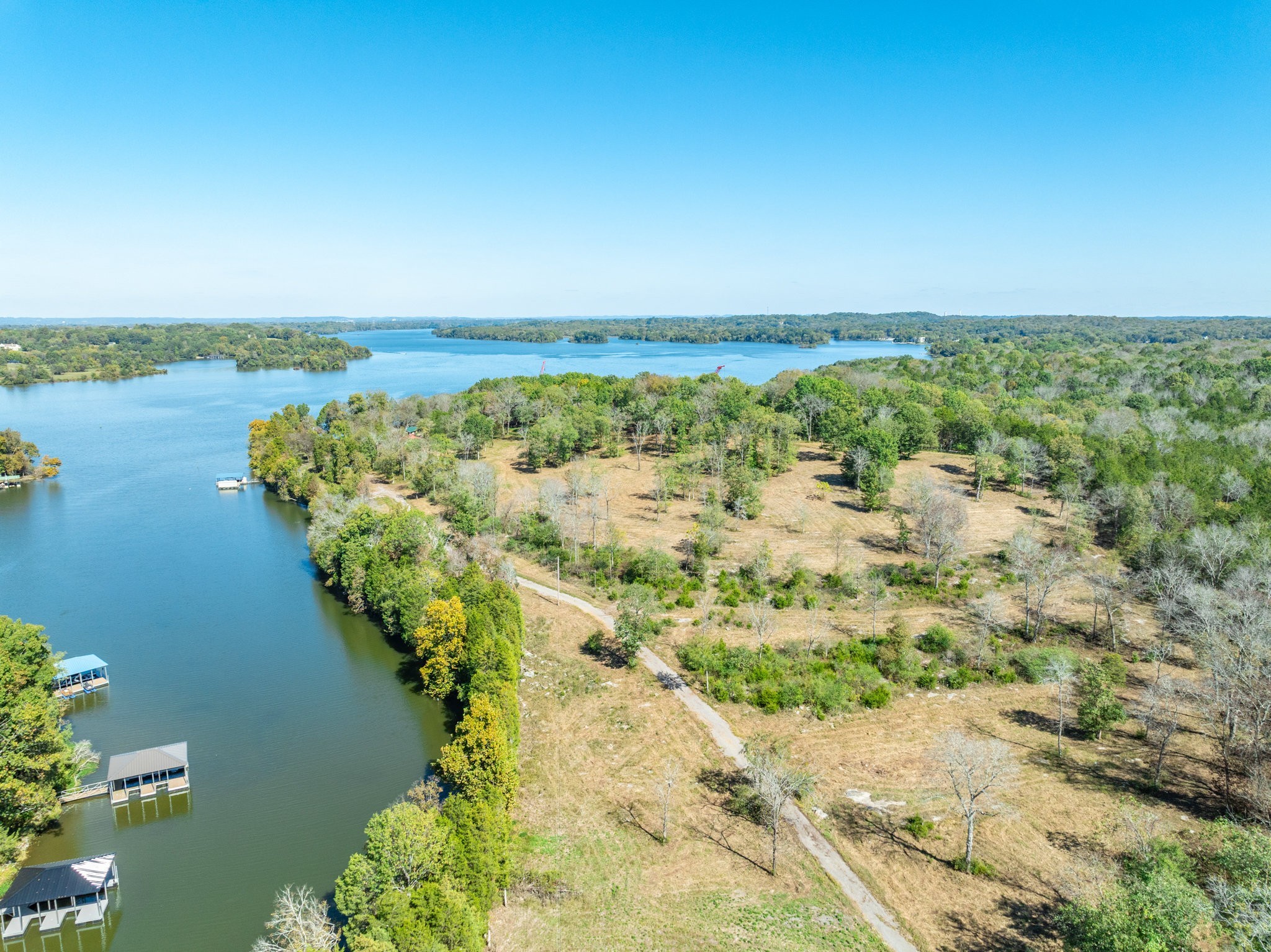 3150 Nonaville Road Mount Juliet, TN 37122 - Photo 3 of 62 a view of a lake with a mountain