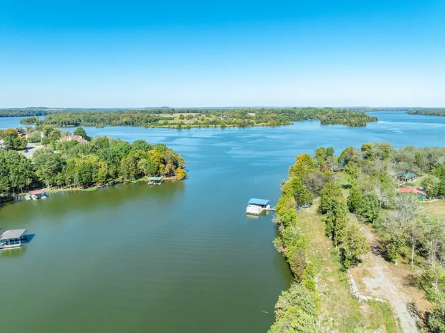 an aerial view of a house with a garden