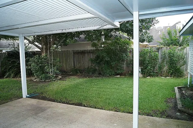 a view of a porch with a yard