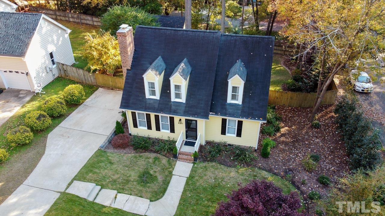 4309 Pleasant Grove Church Road Raleigh, NC 27613 - Photo 3 of 29 front view of a house with a yard