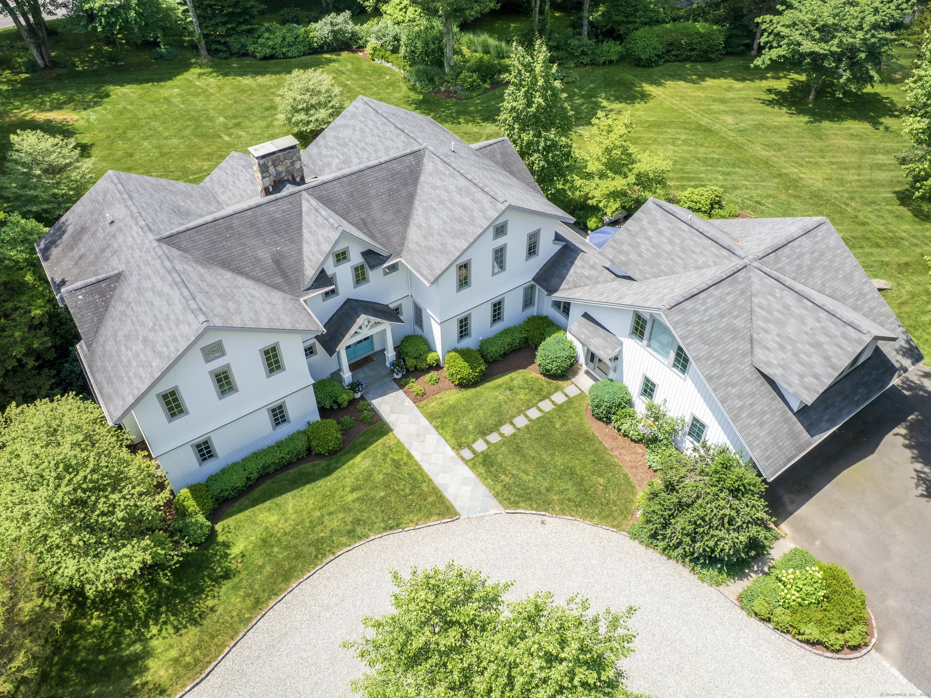 192 Catalpa Road Wilton, CT 06897 - Photo 1 of 1 an aerial view of a house with a garden