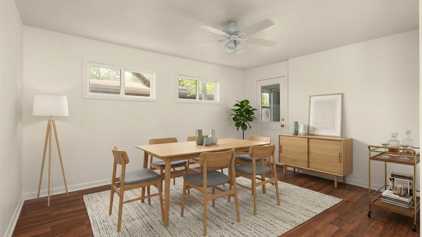 206 East Skyview Road Austin, TX 78752 - Photo 12 of 32 Digitally styled. Hardwood floors and bright windows create a warm and inviting dining area. Dining area. Digitally styled.