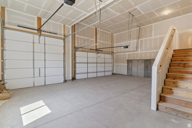 5777 West 4100 South Hooper, UT 84315 - Photo 37 of 41 Garage with a garage door opener