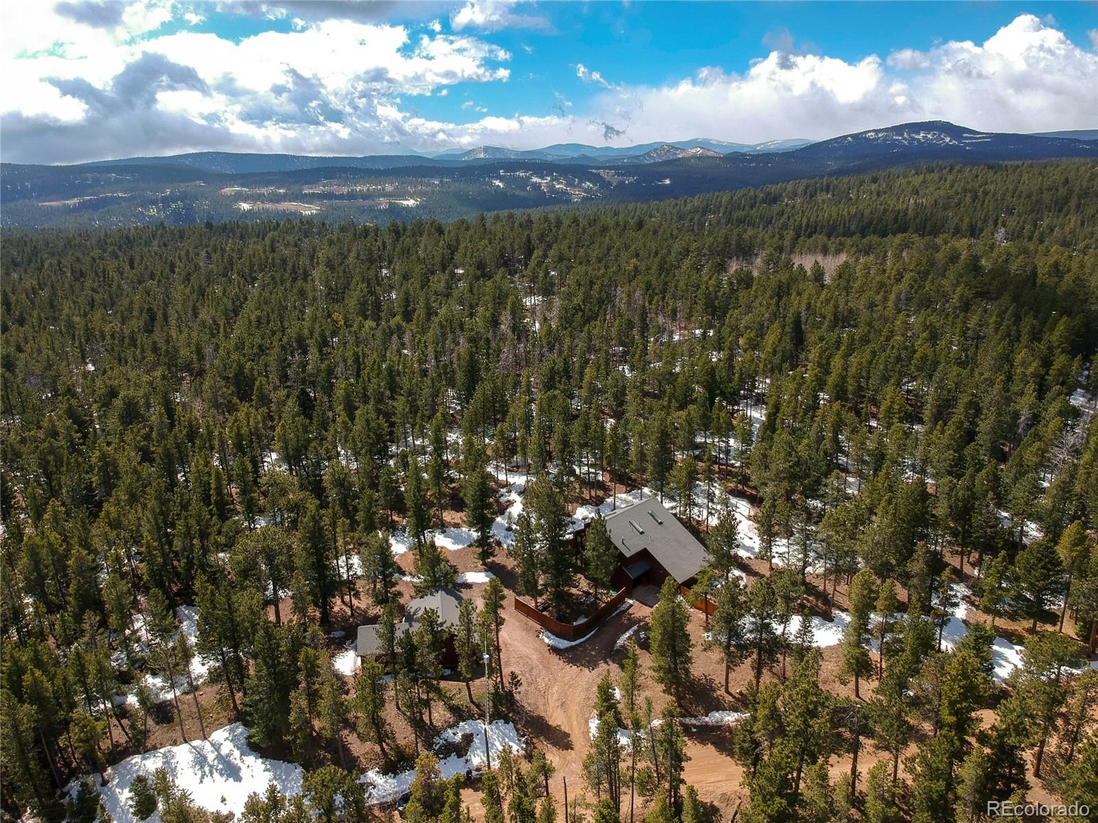 222 Ridge Road Ward, CO 80481 - Photo 1 of 40 a view of an outdoor space and mountain view