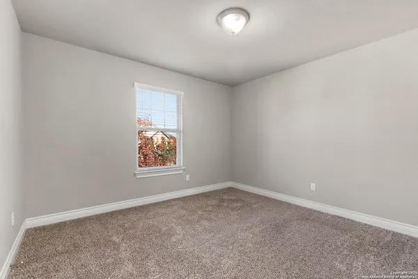 an empty room with window