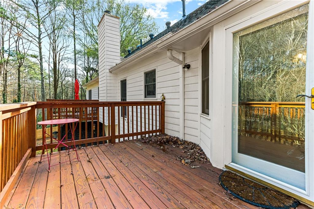 1394 Maple Drive Southwest Lilburn, GA 30047 - Photo 28 of 31 a view of a wooden deck