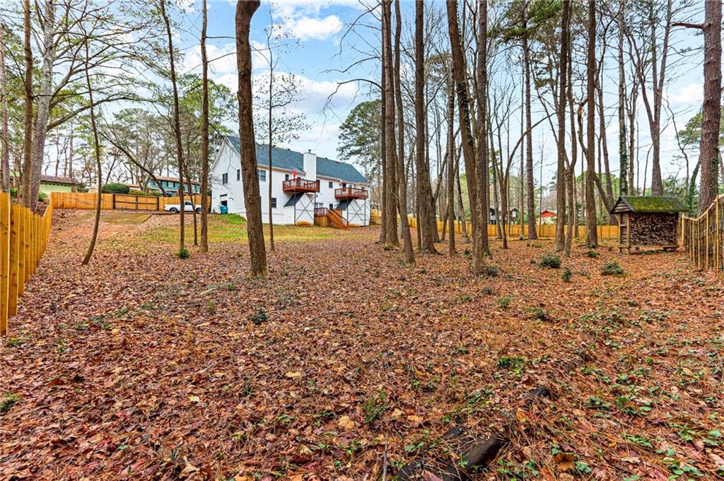 1394 Maple Drive Southwest Lilburn, GA 30047 - Photo 31 of 31 a view of outdoor space with garden