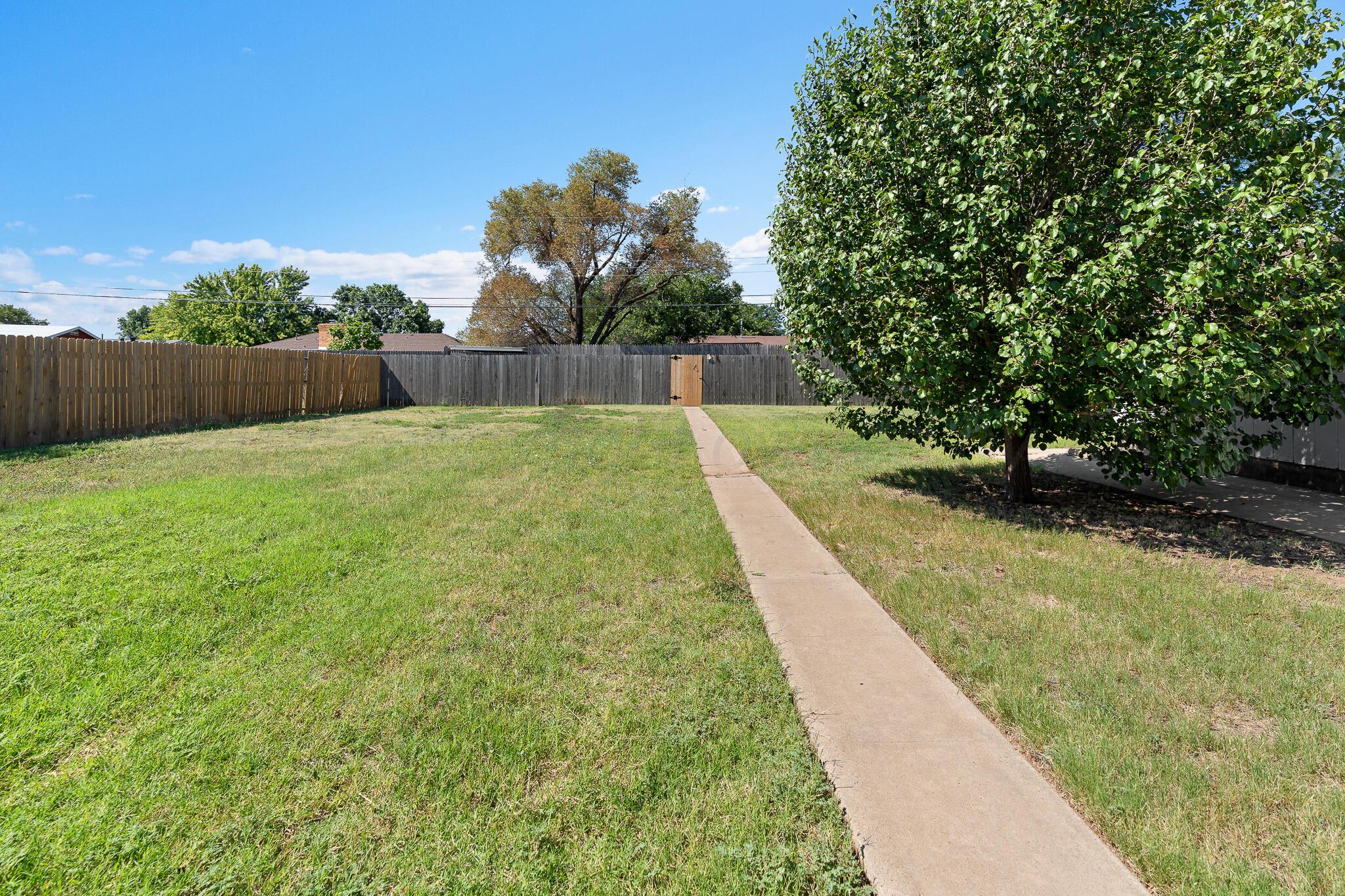 4803 Carole Lane Amarillo, TX 79110 - Photo 19 of 23 a view of a backyard