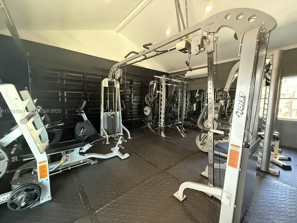 a view of a room with gym equipment
