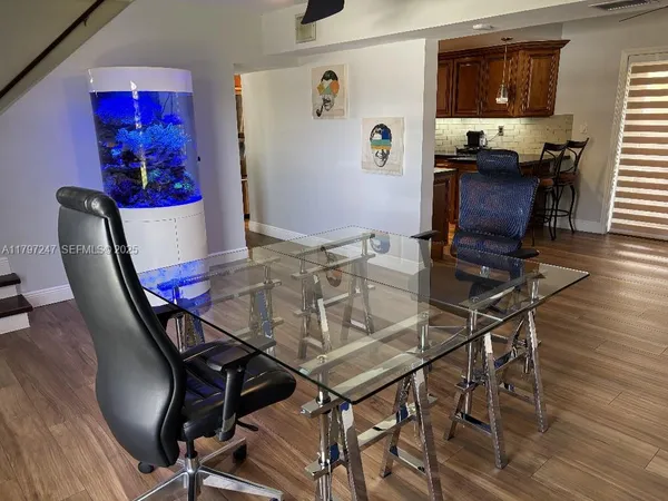 a workspace with wooden floor