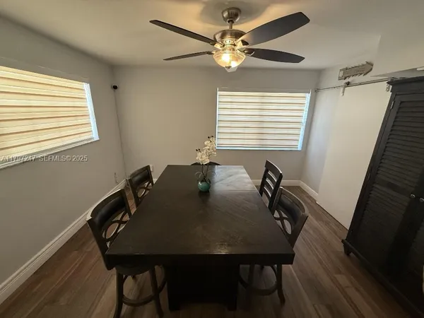 a workspace with furniture and a window