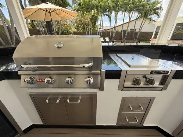 a view of appliances with furniture