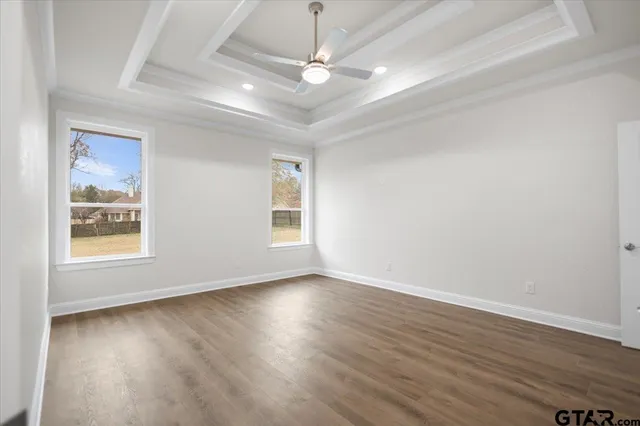 a spacious bathroom with a sink a mirror and a shower
