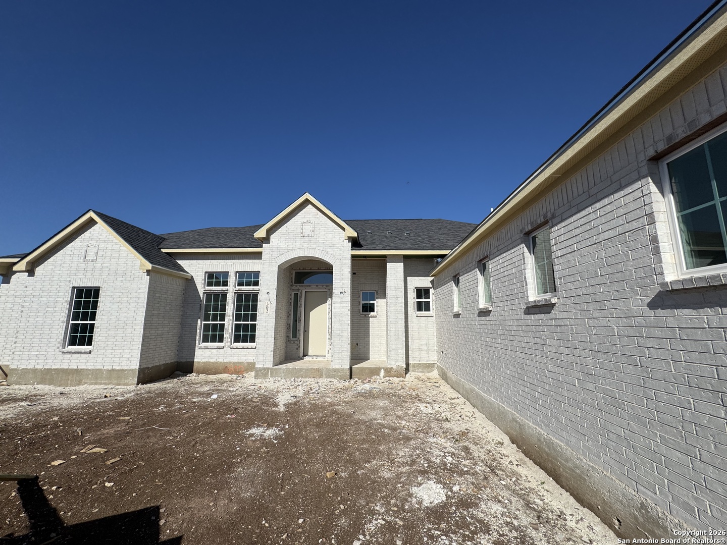 302 Venado Oaks Rio Medina, TX 78066 - Photo 25 of 34 a view of a house with a yard