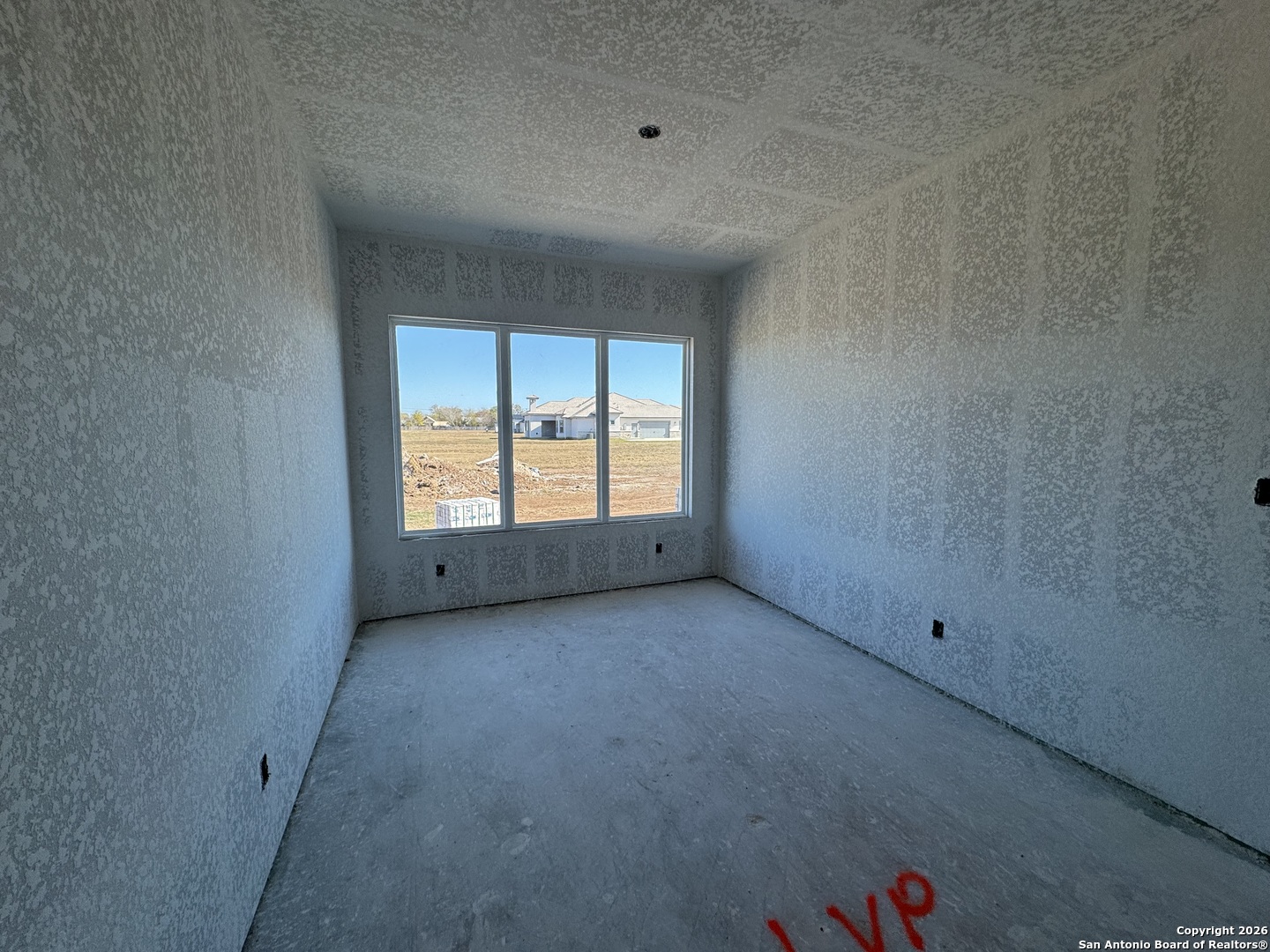 302 Venado Oaks Rio Medina, TX 78066 - Photo 31 of 34 a view of an empty room with a window