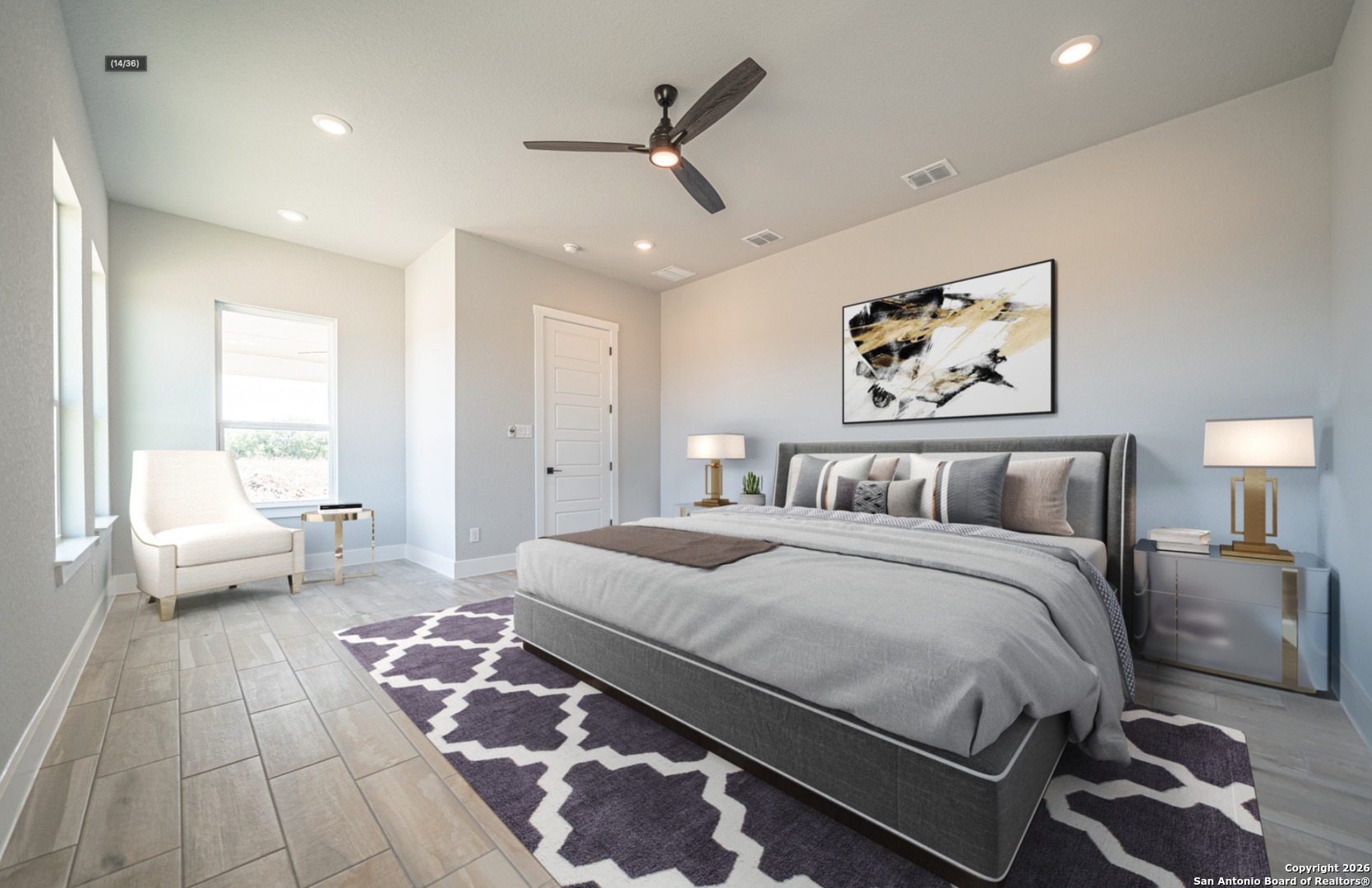 302 Venado Oaks Rio Medina, TX 78066 - Photo 9 of 34 a spacious bedroom with a bed a couch and a window