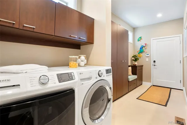 a utility room with dryer and washer