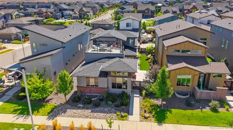 a aerial view of a house with a garden and plants