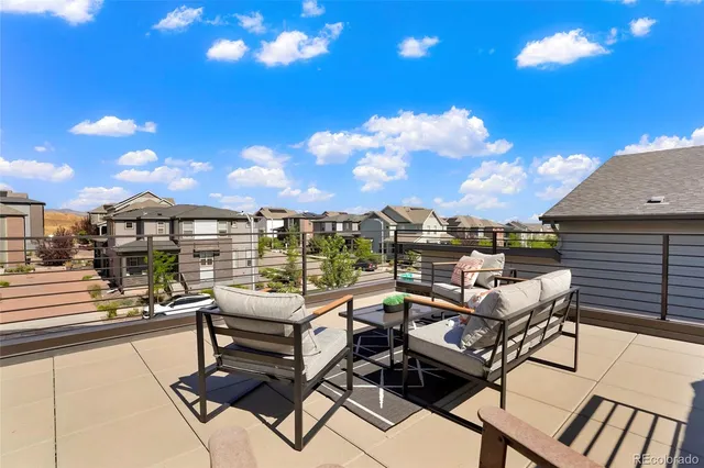 a view of a terrace with seating area