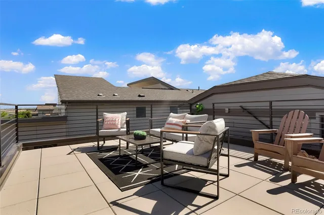 a view of backyard with outdoor seating