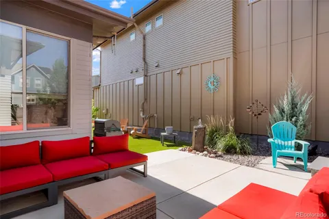 a building outdoor space with patio furniture