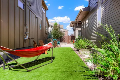 a park with a bench and trees